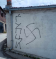Навредлив графит со кукаст крст и натпис “Ѓупци“